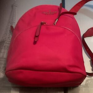 Kate Spade Vibrant Pink Backpack . Stain on top and another near the bottom as s